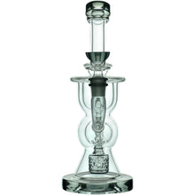 The Calibear Vortex Seed Of Life Recycler Dab Rig features clear glass, a cylindrical neck, round chamber, wide base, and a visible intricate Seed of Life percolator inside the clean, unused rig.