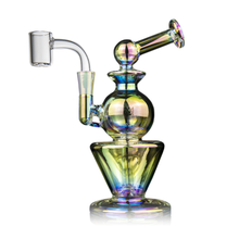 The MJ Arsenal Gemini Mini Dab Rig features a spherical chamber, angled mouthpiece, and glass banger, all crafted from durable borosilicate glass—perfect as a portable dab rig.