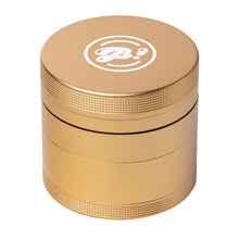The BIGFUN! Medium Grinder features a gold-colored aluminum body, textured grip for easy handling, and a white logo on top—ideal for efficient pollen sifting, shown here on a white background.