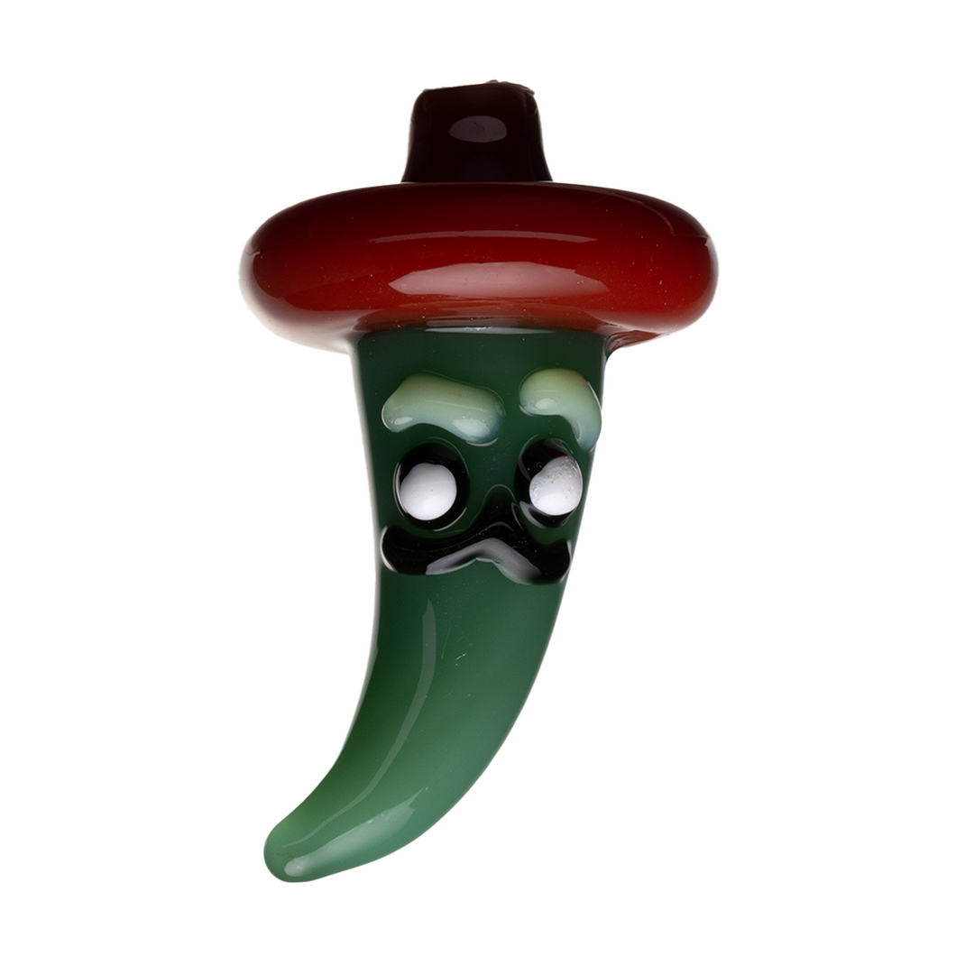 Add playful flair to your setup with the Human Grade Chili Pepper Glass Carb Cap—a whimsical borosilicate glass piece shaped like a chili pepper with a face and hat, perfect as a unique carb cap or conversation starter.
