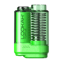 The Lookah Turtle Vaporizer 510 Thread Battery is a compact, green, rectangular device with a transparent top, visible coil, and is compatible with 510 tanks for versatile use.