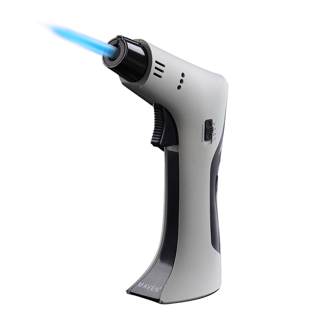 The Maven Thunder Torch (Unfilled) is a handheld, butane refillable torch with a windproof jet flame, trigger ignition, and sleek white-and-black design, shown standing upright on a white background.