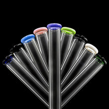 Eight Glassic Beaker Bongs with colorful lips (black, white, blue, pink, green, and more), each 10" tall and 5mm thick, are fanned out against a black background.
