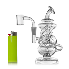 The MJ Arsenal Infinity Mini Dab Rig, crafted from clear borosilicate glass with unique spiral and chamber designs, is pictured next to a bright green lighter on a white background.