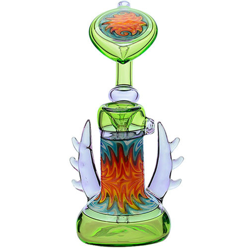 The Calibear Horned Wig Wag Upright Bubbler features a green base, orange, red, and blue swirling patterns, translucent side wings, and a sunburst top. Crafted from borosilicate glass.