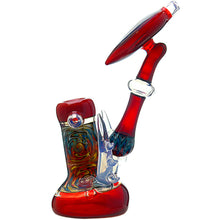 The Calibear Horned Wig Wag Upright Bubbler features vibrant red and multicolored swirling patterns, a tilted neck, clear and colored accents, and is crafted from durable borosilicate glass.