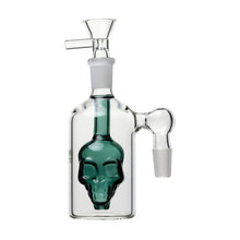 The 14mm Skull Ash Catcher 45° or 90° is a clear glass bottle with a green skull inside and angled or straight tube, offering both decorative flair and functional filtration for your water pipe.