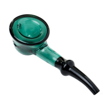 The Human Grade Fleur Hand Pipe is a green and black borosilicate glass hand pipe with a deep bowl and curved stem, featuring a classic design. Photographed on a white background.