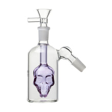 The 14mm Skull Ash Catcher (45° or 90°) is a clear glass attachment with a purple-tinted skull chamber, straight neck, side joint, and funnel-shaped bowl—perfect as a unique perc ash catcher for your water pipe.