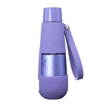 A portable, lavender Thicket V2 Water Pipe with a leak-proof design and flip handle, featuring "THICKET" embossed on its sleek surface. The pipe has smooth, rounded edges for a modern look.