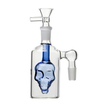 The 14mm Skull Ash Catcher (45° or 90°) has a blue-tinted skull inside the clear glass, angled joints, and a removable flower bowl on top, designed for 14mm water pipes. Shown here against a white background.