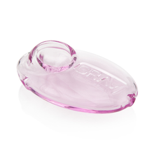 The Grav Pebble Spoon is a translucent, light purple hand pipe with an oval glass design, built-in bowl, and "GRAY" embossed on top. This discreet piece is shown on a white background.