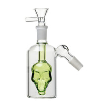The 14mm Skull Ash Catcher (45° or 90°) is a clear glass attachment with a green skull design, Flower Bowl, and angled connector. It fits most 14mm water pipes, offering enhanced filtration and style.
