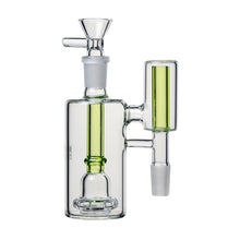 The Human Grade The Inverter Ash Catcher is a clear glass 14mm attachment with green accents, featuring a cylindrical main and vertical side chamber, a top flower bowl, and multiple percs for enhanced filtration and smoother sessions.