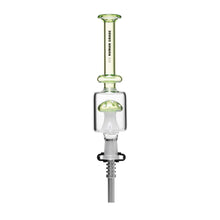The Human Grade Shroom Nectar Collector is a borosilicate glass smoking accessory shaped like a syringe, with a green top, clear middle featuring a mushroom perc, and comes with a gray base attached to the tube.