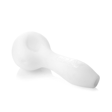 The Grav Sandblasted Spoon is a white matte pipe with a rounded deep bowl and flat mouthpiece, shown on a white background. A subtle embossed logo on the side adds an elegant touch.
