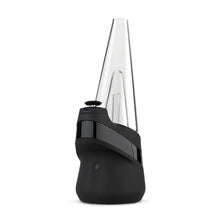 The New Peak Vaporizer is a modern, intelligent device with a black silicone base, clear glass top, and button with upper band—designed for compatibility with 3D Chamber technology for an enhanced vaporizing experience.