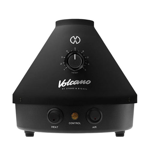 The Storz & Bickel Volcano Classic is a black, cone-shaped German vaporizer with convection heating, a temperature control dial, and three front buttons: Heat, Control, and Air.