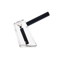 The MJ Arsenal Fulcrum Bubbler is a modern, transparent piece made from borosilicate glass with a sleek black mouthpiece and filter, displayed on a plain white background.