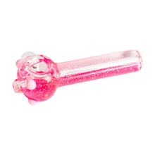 The Red Eye Glass 4.5" Sparkle Liquid Glass Pipe is a translucent pink borosilicate hand pipe with glitter and small decorative bumps, shown isolated on a white background.