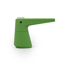 The SOFTGLASS PIER BUBBLER is a modern, green, angular bubbler with a long spout and small transparent window on top, featuring sleek lines similar to a silicone water pipe, displayed against a plain white background.
