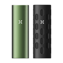 Two PAX Flow Vaporizers with Grip Sleeve Bundle: one green with a white X-shaped light, and one black with oval cutouts and the same X-shaped light, both standing upright side by side.