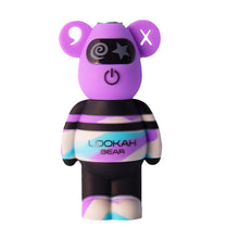 The Lookah Bear 510 Thread Battery is a small, purple, bear-shaped device with cartoon features, an on/off button on its chest, "LOOKAH BEAR" text on its body, and mismatched ear symbols. Compatible with 510 tanks.