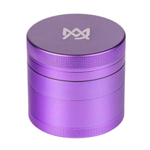 The MJ Arsenal 4 Piece Grinder is a metallic purple aluminum grinder with a textured grip and a white geometric logo on the lid, shown on a white background.