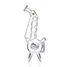 The Lookah Glass 13" Cool Recycler Giraffe is a clear bong designed like a giraffe with a long ridged neck, circular body, four legs, and yellow eye detail. It includes a 14mm male glass bowl. The ROOR logo appears on the body. Crafted from Boro Schott Glass.