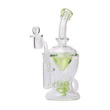 The Human Grade The Nuke Glass Rig is a clear and light green borosilicate glass dab rig with a curved mouthpiece, rounded base, side chamber, and matching bowl attachment, shown on a plain white background.