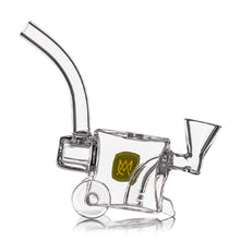 The MJ Arsenal Woodchipper Blunt Bubbler is a clear glass water pipe shaped like a lawn mower, with a square body, long curved mouthpiece, funnel bowl, smooth water filtration, small wheels, and a yellow logo on the side.