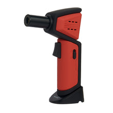 The Maven Nova Torch (Unfilled) is a handheld, refillable butane lighter with a red and black body, windproof jet flame, black nozzle, trigger switch on the handle, and upright standing base.