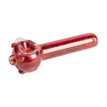 The Red Eye Glass 4.5" Sparkle Liquid Glass Pipe is a red, glittery glass hand pipe with a rounded bowl and straight stem, accented around the bowl and displayed against a white background.