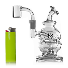 The MJ Arsenal Royale Mini Dab Rig, made of clear borosilicate glass with a unique rounded shape and logo, stands upright next to a bright green lighter on a white background.