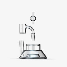 The SOFTGLASS TANDEM BASE KIT features a modern transparent design with four parts—a cylindrical base, pipe-like arm, funnel, and small globe top—resembling a Bubble Cap, all shown floating in alignment on a white background.