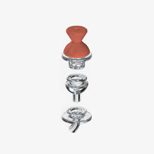 An exploded view of the SOFTGLASS CONVERTIBLE CAP SET shows its three clear glass parts and a unique red silicone sleeve top, all arranged vertically on a white background.