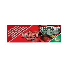 A red pack of Juicy Jay's Flavored Papers in strawberry, triple-dipped for extra flavor. Marked 1 1/4 size, it shows strawberries and states it's only for legal smoking herbs—not tobacco.