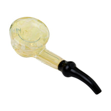 The Human Grade Fleur Hand Pipe is a borosilicate glass piece with a rounded yellow-tinted bowl and black curved stem, offering a classic design set against a white background.