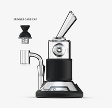 The SOFTGLASS CONVERTIBLE CAP SET features a modern glass Tandem Rig with black silicone sleeve accents on a base. Next to it, a unique cap spinner carb cap is displayed, both set against a plain white background.