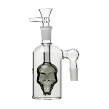 The 14mm Skull Ash Catcher 45° or 90° features a clear glass bottle with an internal skull design, funnel top, and side spout. Use it as a water pipe attachment or pair with your favorite flower bowl for added style and filtration.