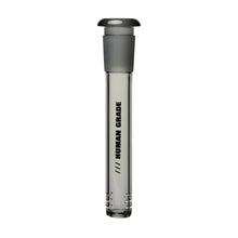 A clear glass vial with a gray stopper, labeled HUMAN GRADE in black vertical text, stands upright on a white background—ideal for storing or replacing your Human Grade Color Downstems (14MM) securely.