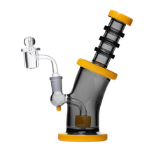 The Human Grade 8" Bent Neck Dab Rig features borosilicate glass, a tilted black and yellow body, cylindrical chamber, ringed mouthpiece, and a clear 14mm quartz bucket bowl piece, shown against a white background.
