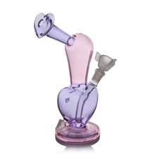 The MJ Arsenal Burning Heart (Valentine's 2024) is a limited edition heart-shaped borosilicate glass water pipe in purple and pink, featuring a tilted neck, round base, and frosted glass bowl—perfect for Valentine’s Day.