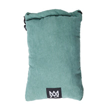 The MJ Arsenal Padded Drawstring Pouch is a soft, rectangular teal case with a top drawstring and a black patch featuring a white abstract logo—ideal for storing glass accessories. Shown here on a white background.