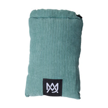 The MJ Arsenal Padded Drawstring Pouch features teal ribbed fabric and a black patch with a white logo—ideal for storing glass accessories. Shown on a white background.