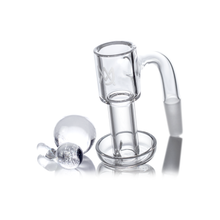 The MJ Arsenal Full Weld Quartz Terp Slurper, featuring a side-arm joint and paired with a marble and cylindrical accessory, is displayed on a reflective white surface—ideal for upgrading your Mini Rigs setup.