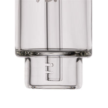 Close-up of the MJ Arsenal Alpine Series - Steamboat Bubbler, made from clear borosilicate glass with a cylindrical shape, thick base, vertical inner tube, and a small horizontal notch inside.