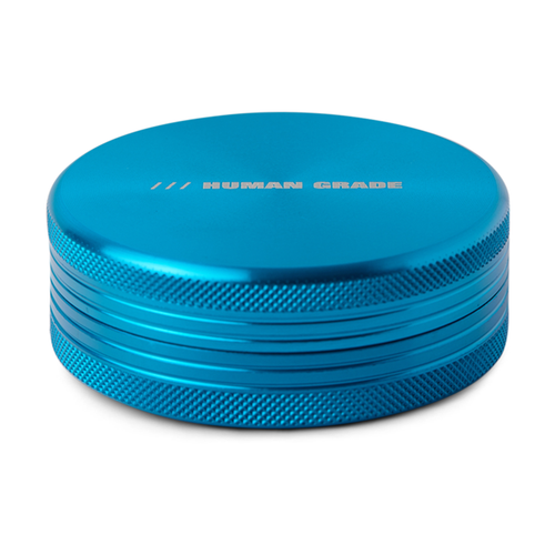 The Human Grade Grinder 1C is a blue, round, 2.5