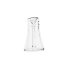 The MJ Arsenal Vulkan Bubbler is a clear borosilicate glass piece with a flared base, narrow top, and vertical internal tube, shown standing upside down on a white background. Its smooth, symmetrical design makes it highly portable.