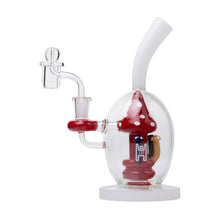 The Human Grade Mushroom Globe Glass Rig is made from borosilicate glass, featuring a red and white mushroom in a clear chamber, with a curved mouthpiece, 14mm quartz bucket, side-mounted bowl, and round base.